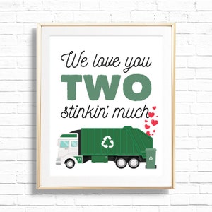 May include: A green and white garbage truck with a recycling symbol on the side. The truck is surrounded by red hearts and the text "We love you TWO stinkin' much".