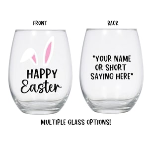 May include: Two clear glass wine glasses with black text. The front glass has a pink bunny ear design and the text "HAPPY Easter". The back glass has the text "*YOUR NAME OR SHORT SAYING HERE*"
