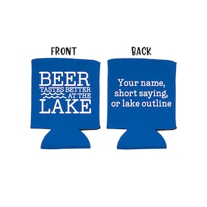 May include: Blue and white can cooler with the text "BEER TASTES BETTER AT THE LAKE" on the front. The back is blank and ready for personalization.