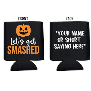 May include: Black Halloween-themed can cooler with the text "Let's get SMASHED" and a jack-o'-lantern graphic on the front. The back of the cooler has the text "*YOUR NAME OR SHORT SAYING HERE*".