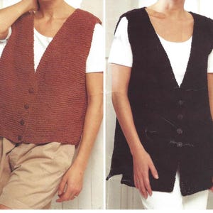 May include: Two knitted vests with button closures. The vest on the left is a rust color and the vest on the right is black.