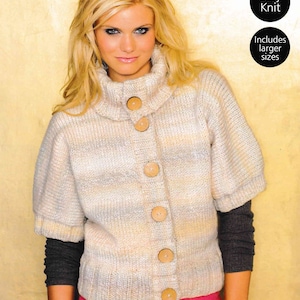 May include: A light beige knitted cardigan with a high collar and button closure. The cardigan has a striped pattern and features wooden buttons. The model is wearing a pink shirt underneath the cardigan.