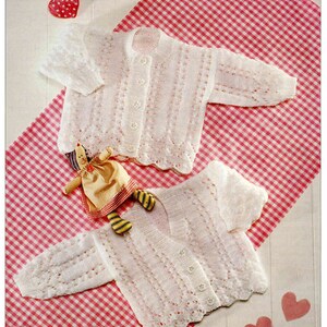 Baby lace cardigans v neck round neck in DK-8 ply-Light worsted  fits 16-26 chest Download PDF Knitting Pattern