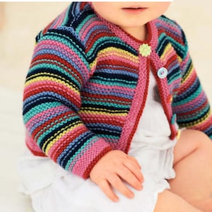May include: A multi-coloured, striped baby cardigan in shades of pink, blue, yellow, and green. The knitted sweater has long sleeves and is fastened with two decorative buttons. A cosy and stylish garment for infants.