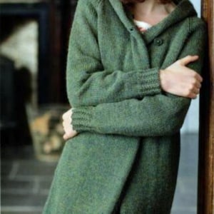 May include: A green hooded cardigan with a button fastening. The cardigan is made from a soft, textured yarn.