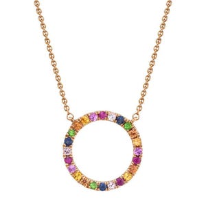 May include: A rose gold necklace with a circle pendant set with colorful gemstones. The pendant is made of small round gemstones in shades of red, orange, yellow, green, blue, and purple.