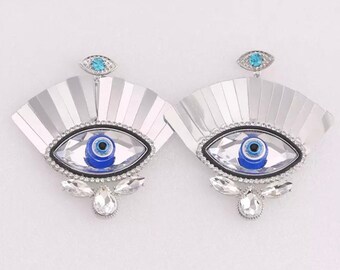 Fabulous Silver eye earrings with Di monte detail.