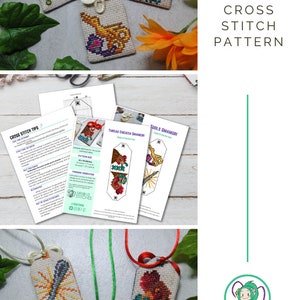 May include: A collection of cross-stitch omamori charms with various designs, including a rooster, a dragon, and a spoon. The image also features cross-stitch pattern instructions and the text "STITCHY OMAMORI CROSS STITCH PATTERN".