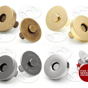 Peut inclure: Plusieurs fermoirs magnétiques ronds en métal doré, laiton et argenté. Chaque bouton-pression a un trou central et une petite tige. Des rondelles en plastique transparent sont incluses. L'image comprend un cercle rouge avec le texte "PICK YOUR DESIRED COLOR!"