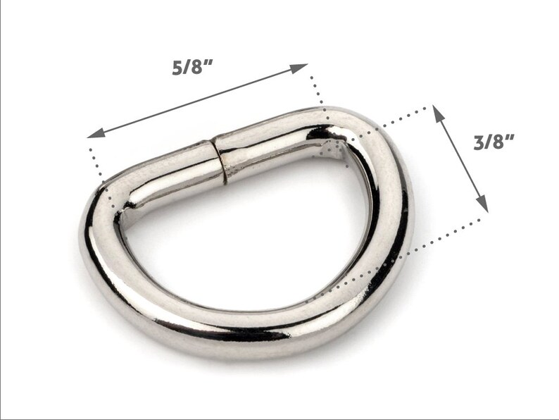 May include: A silver metal D-ring with a 5/8 inch diameter and a 3/8 inch width.