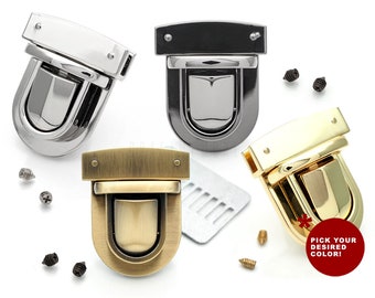 May include: Four metal purse clasps in different finishes: silver, black, gold, and antique brass. Each clasp has a rectangular top piece and a rounded bottom piece with a small opening. The clasps are arranged in a square pattern on a white background.  "Pick your desired color!" is written in red text on a white background.
