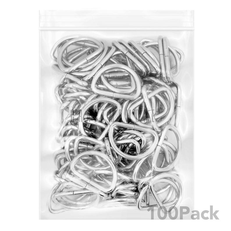 May include: A clear plastic bag filled with 100 silver metal D-rings. The bag has the text "100Pack" printed on the bottom.