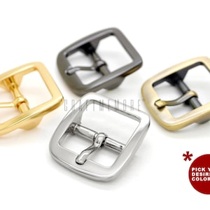 Könnte beinhalten: Vier Metall-Gürtelschnallen in verschiedenen Ausführungen: Gold, Silber, Antikmessing und Schwarznickel. Wählen Sie Ihre gewünschte Farbe!