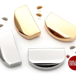 Op de afbeelding: Drie halfronde metalen doppen in goud en zilver met schroeven. Kies uw gewenste kleur.