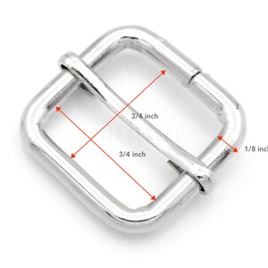 K&ouml;nnte beinhalten: Silberne Metallschnalle mit einer Breite von 3/4 Zoll und einer Dicke von 1/8 Zoll.