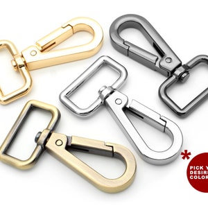 May include: A selection of metal swivel clasps in gold, silver, gunmetal, and antique brass finishes. Each clasp has a rectangular loop and a spring-loaded hook. A red circle with the text "PICK YOUR DESIRED COLOR!" is in the bottom right corner.