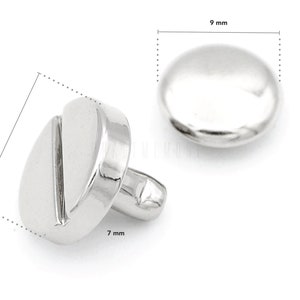 May include: Silver metal button with a flat, round top and a slightly domed bottom. The button is 9 mm in diameter and 7 mm in height.