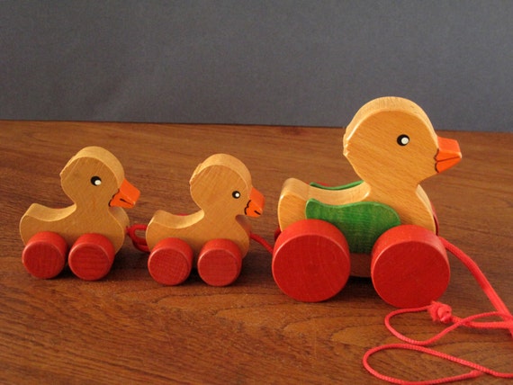 wooden toy duck on wheels