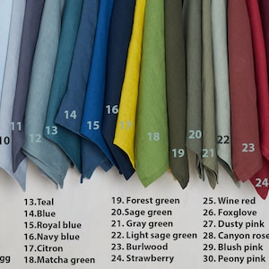 May include: A swatch card with 33 different fabric samples in various colors, including peach, burnt orange, cinnamon, rusty brown, saffron, cocoa, dark grey, light grey, icy blue, bluishy grey, blueberry, grayish duck egg, teal, blue, royal blue, navy blue, citron, matcha green, forest green, sage green, gray green, light sage green, burlwood, strawberry, wine red, foxglove, dusty pink, canyon rose, blush pink, peony pink, dusty purple grey, purple grey, and lavender.