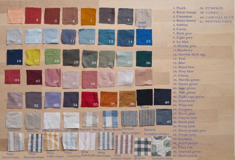 May include: A chart of 41 different linen fabric swatches, each labeled with a number and a color name. The swatches are arranged in rows and columns, and the color names are listed on the right side of the chart. The chart is on a wooden surface.