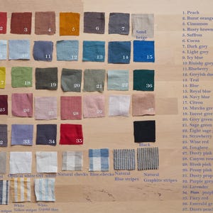 May include: A chart of 36 different fabric swatches, each labeled with a number and a color name. The swatches are arranged in rows and columns, and the color names are listed on the right side of the chart. The colors range from peach to emerald green.