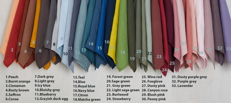 May include: A swatch card with 33 different fabric samples in various colors, including peach, burnt orange, cinnamon, rusty brown, saffron, cocoa, dark grey, light grey, icy blue, bluishy grey, blueberry, grayish duck egg, teal, blue, royal blue, navy blue, citron, matcha green, forest green, sage green, gray green, light sage green, burlwood, strawberry, wine red, foxglove, dusty pink, canyon rose, blush pink, peony pink, dusty purple grey, purple grey, and lavender.