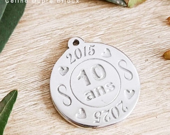 Raw tinplate medal 2015/2025 - Round ø30mm - with "infinity"
