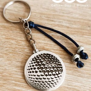 Key ring - Golf ball - ø30mm - with beads and cord.