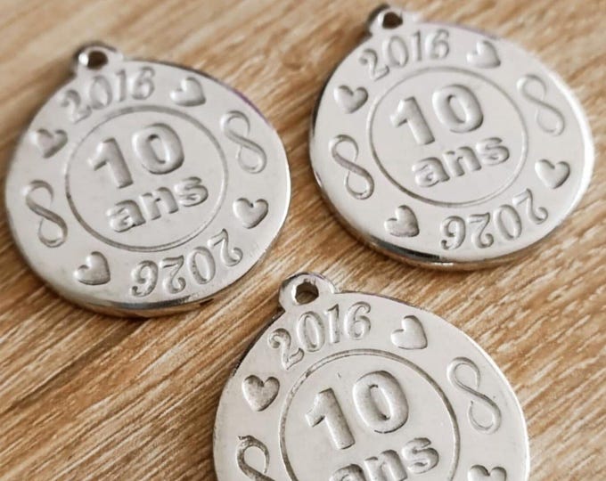 Raw tinplate medal 2016/2026 - Round ø30mm - with "infinity"