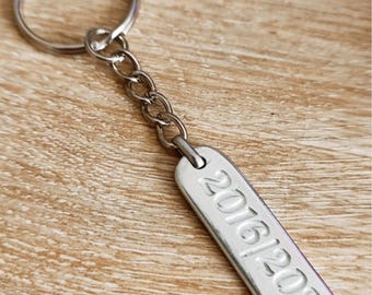 Raw tinplate medal 2016/2026 - Rectangle 10x40mm