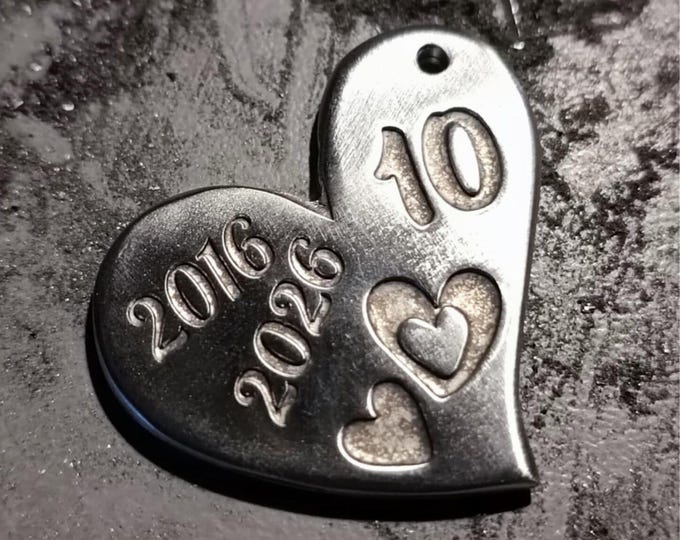 Raw tinplate medal 2016/2026 - Heart 30x35mm - with 10