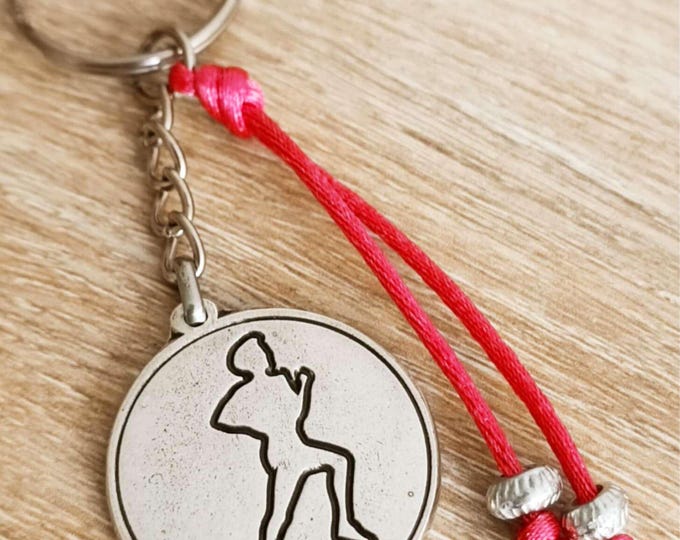 Key ring - Running - ø30mm - with beads and cord.