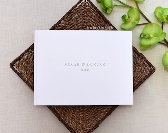 Libro de firmas para boda, compromiso, bautizo o bautismo. Personalizado, tapa dura. Diseño minimalista con fuente serif moderna.