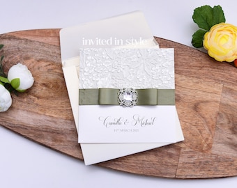Square wedding invitation, optional pocket. Sculpted embossed paper, ivory metallic card with your choice of ribbon colour SAMPLE