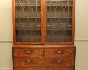 A 19th century Mahogany bookcase display on chest.