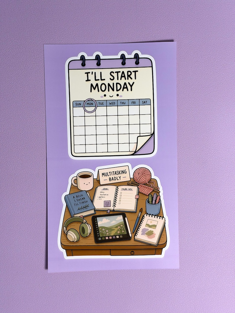 May include: A sticker sheet featuring two illustrations. The top sticker is a calendar with the text I'LL START MONDAY. The bottom sticker shows a desk with a mug, a book titled A BOOK I SWEAR I'LL FINISH, a sign saying MULTITASKING BADLY, yarn, a tablet, and notebooks.