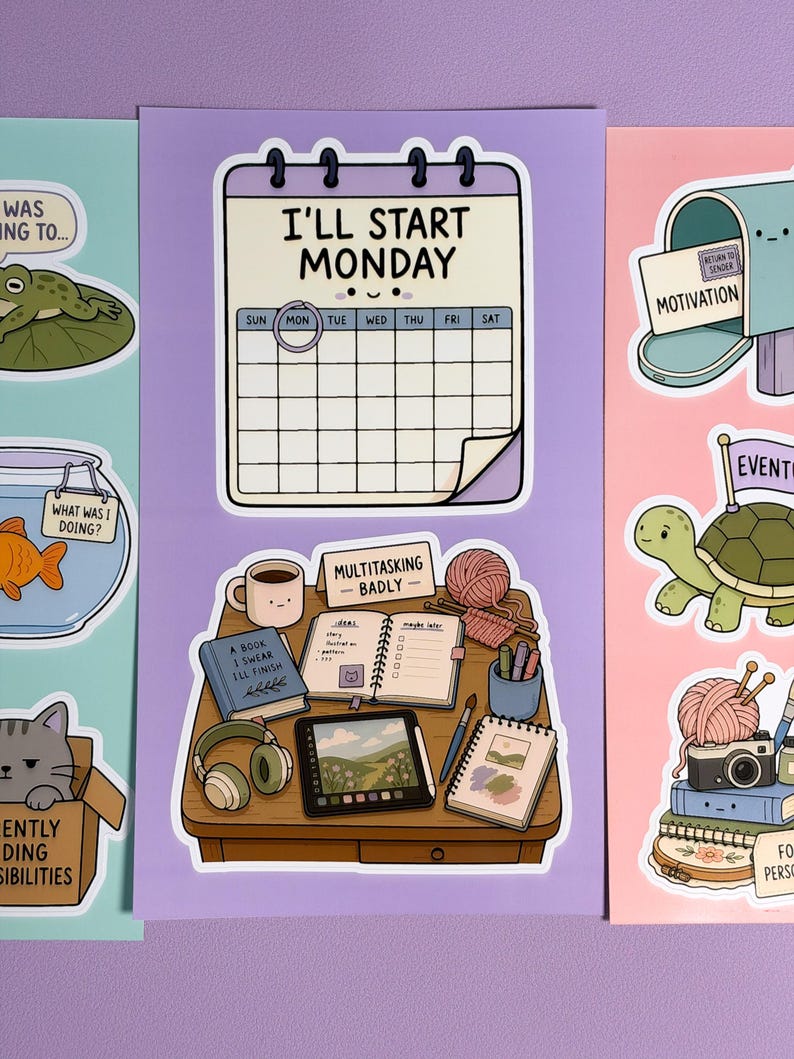 May include: A sticker sheet featuring a purple calendar with the text I'LL START MONDAY and a desk scene with a mug, book labelled A BOOK I SWEAR I'LL FINISH, open planner labelled MULTITASKING BADLY, yarn, headphones, tablet, and sketchbook.