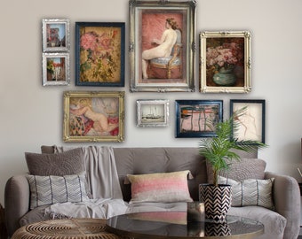 May include: A living room featuring a grey sofa, a coffee table and a wall gallery of framed artwork. The artwork includes a nude figure, floral still life and cityscapes.