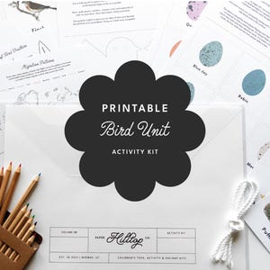 May include: A selection of printable educational resources with a bird theme. The kit features flashcards with bird illustrations, worksheets, and a box of coloured pencils. The central focus is a black flower-shaped graphic with the text "Printable Bird Unit Activity Kit."