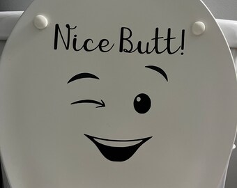 Toilet smiling face saying “nice butt!”