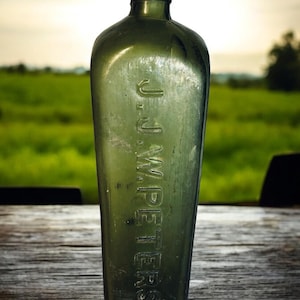 West African Antique Olive Green J.J.W. Peters Gin Bottle Hand Blown 1880’s