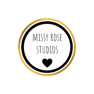 May include: A circular logo with a gold outer ring, a black inner ring, and a white center. The text "MISSY ROSE STUDIOS" is in the center, above a black heart icon. The logo is on a white background.