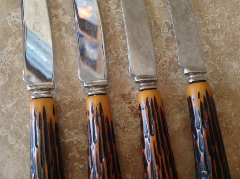 Set of 4 knives with faux antler handles