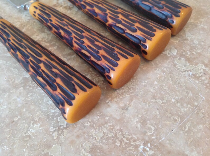 Set of 4 knives with faux antler handles