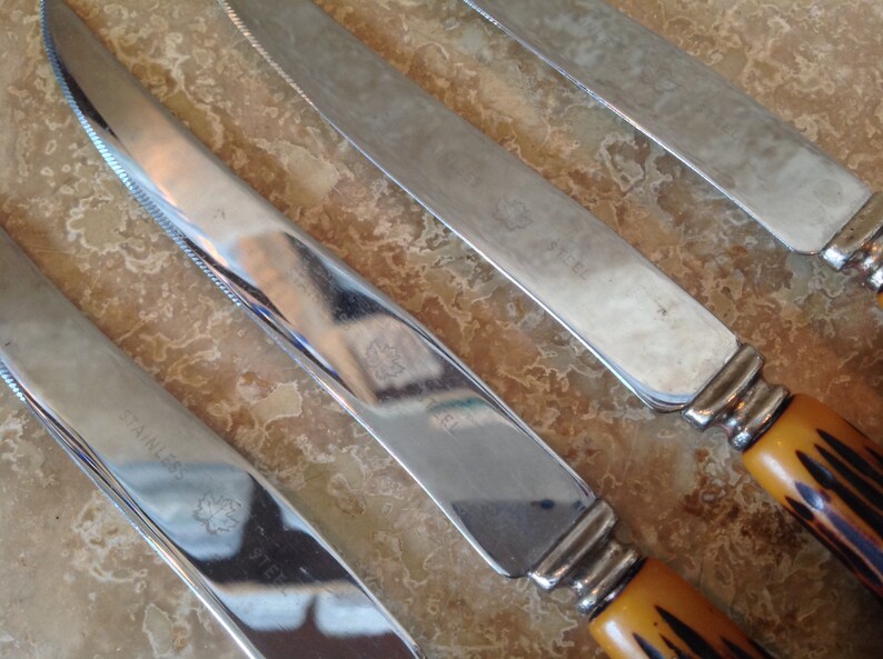 Set of 4 knives with faux antler handles