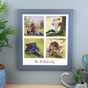 May include: A grey picture frame with a white mount and four photographs of a family. The photos show a family of four in various poses, including a mother and daughter hugging, a father and son playing, and a mother holding a baby. The frame has the text "The Smith family" written below the photographs.