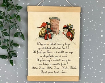 Print canfas Nadolig Pwy sy'dwad dros y bryn. Welsh Christmas canvas hanging print.