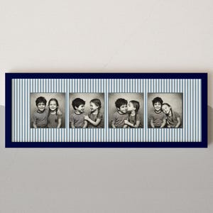 May include: A rectangular navy blue picture frame containing four square black and white photographs of a boy and a girl. The photos are set against a light blue and white vertical striped matting within the frame structure.
