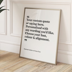 May include: A framed print with a white background and black text. The text reads: "Your custom quote or saying here. Personalised with any wording you'd like. Choose your font, colour & alignment."
