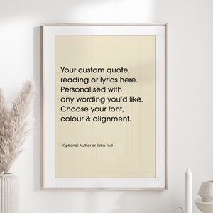 May include: A framed print with a cream background and a white border. The text reads: "Your custom quote, reading or lyrics here. Personalised with any wording you'd like. Choose your font, colour & alignment."